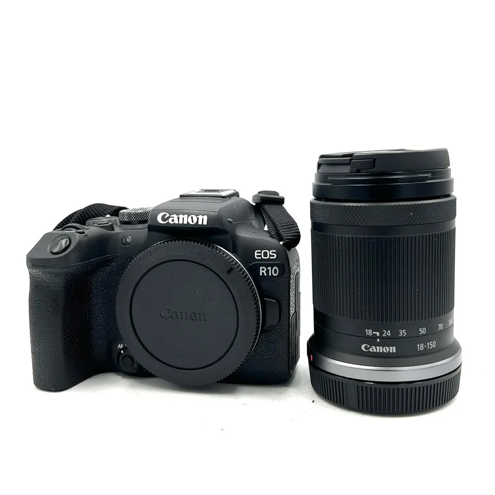 A black Canon EOS R10 mirrorless camera along with 18-150mm lens.